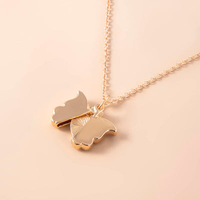 Ouverture papillon je t'aime charme collier enchaîné disponible en argent ou en or cadeau incroyable cadeau contemporain amour minimaliste